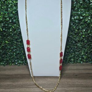 Golden chain necklace with red stone accents